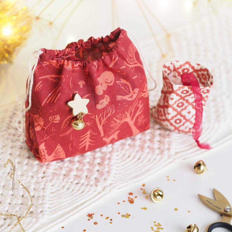 pochon-surprise-noel-cadeau-extrait-cases-avent-2024-ambiance-rouge-laboutiquedemelimelo